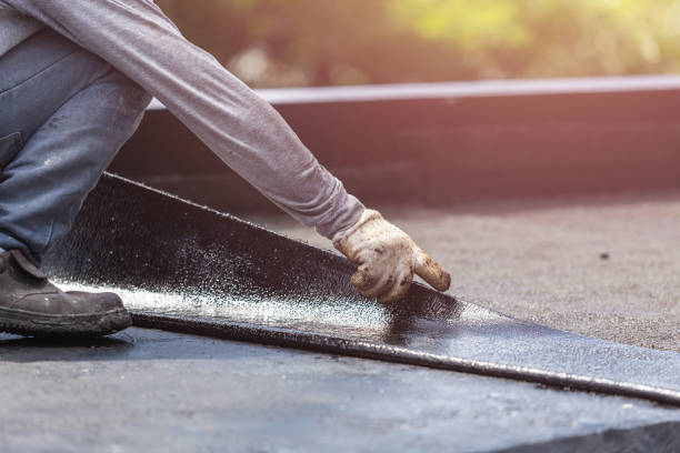 Professional Waterproofing technician working in Yellow Springs, OH